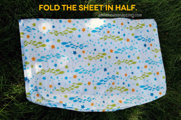 how to roll a fitted sheet fold in half
