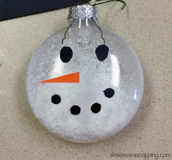 Snowman Ornament made with a glass ball and construction paper
